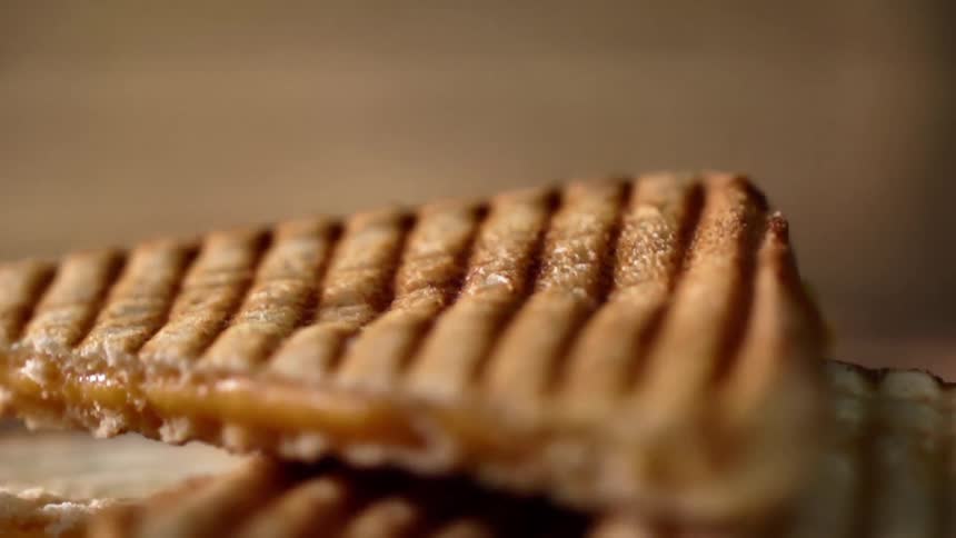 Toasted sandwich falls on the other sandwiches