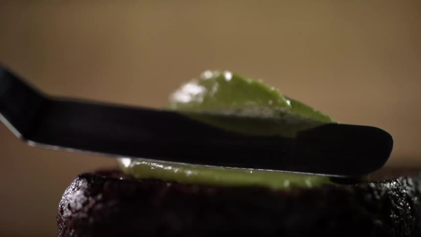 A cake being iced