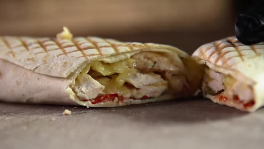 A person separates a cut wrap