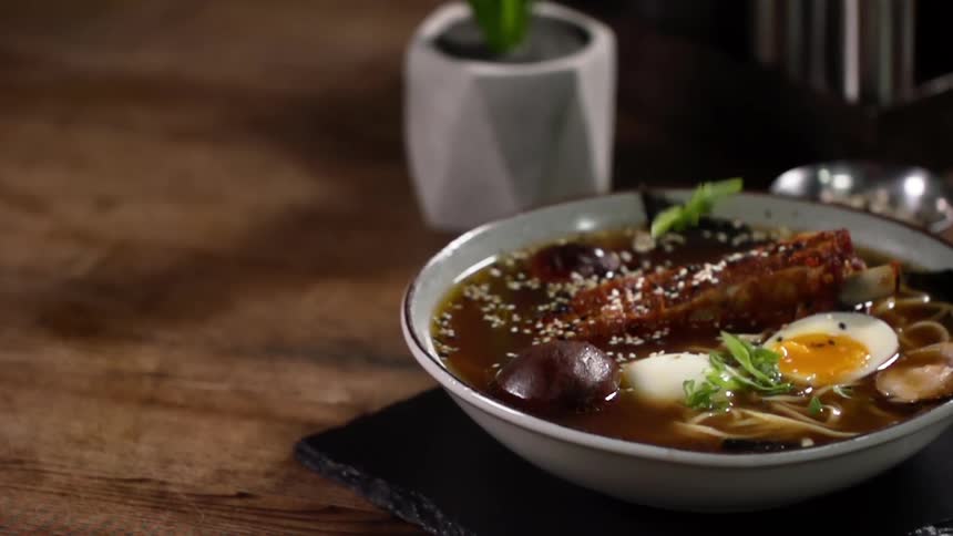 Greens sprinkle on a meat and egg soup