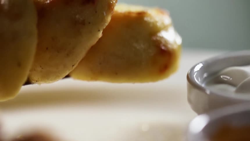 Food is placed down near the sauces