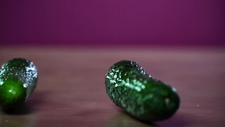 The pickles roll across the table