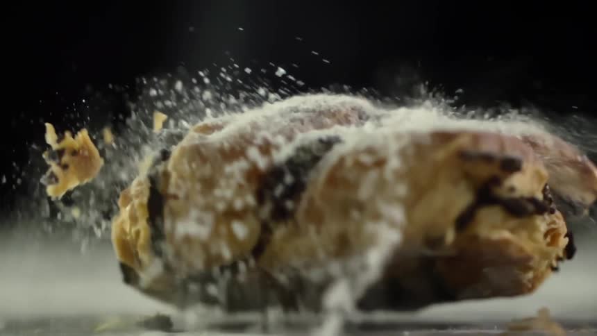 The pastry is dropped on the counter