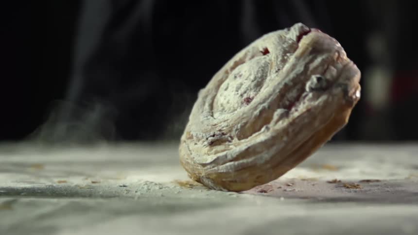 A baked good falls on a table
