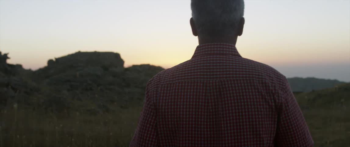 Man Walking Into The Sunset