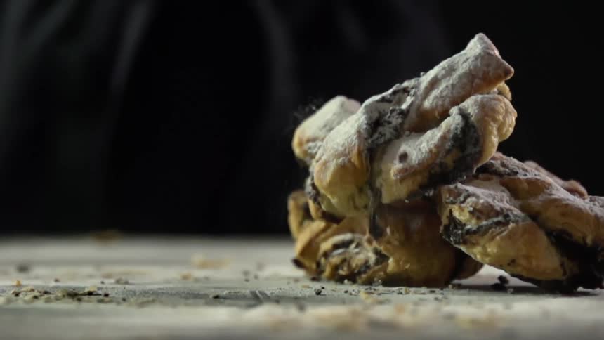 Baked goods falling on to a table