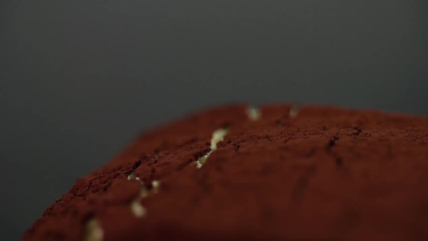 There are cracks in the chocolate on the food