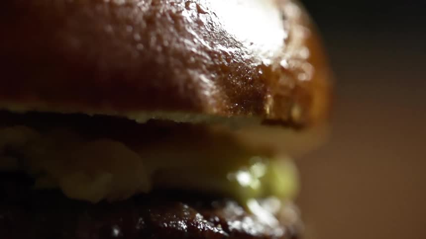 Hamburger bun falls over burger