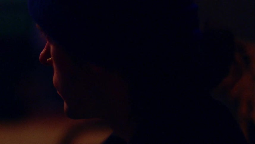 A teenager looking out in to the darkness