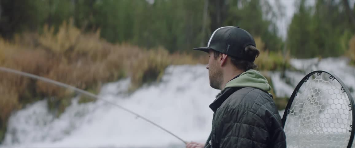 Man fishes in a river