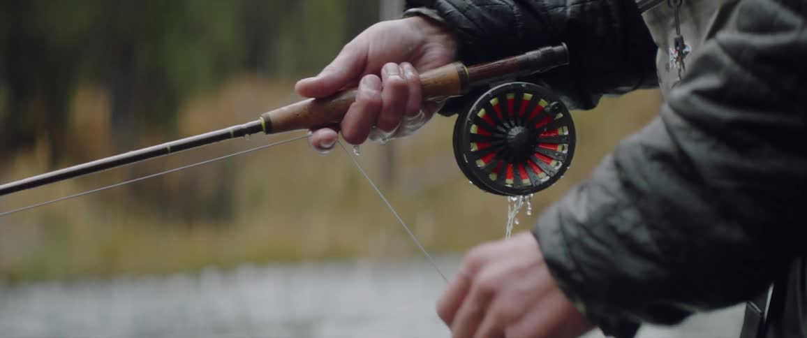 Man fishes in a river