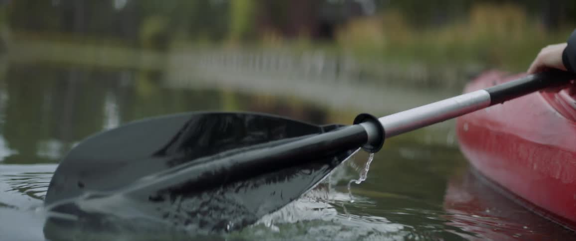 Oar being used to propel through water