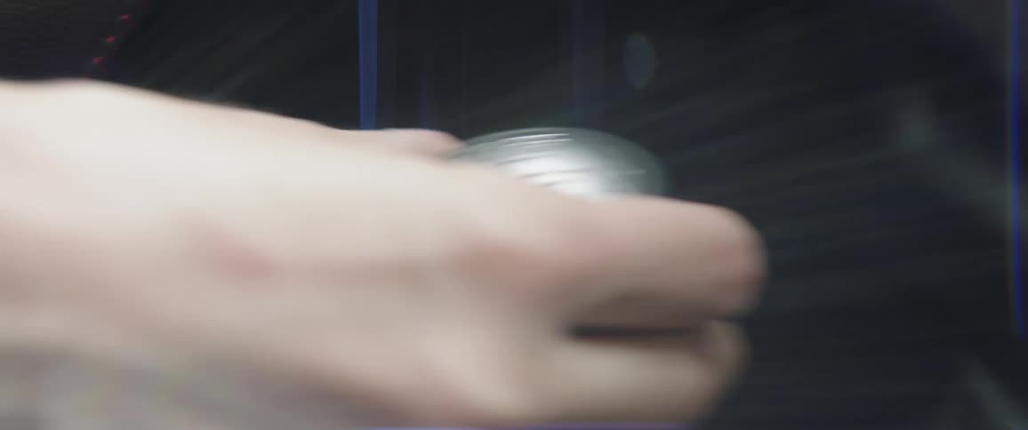A man shifts a knob into position