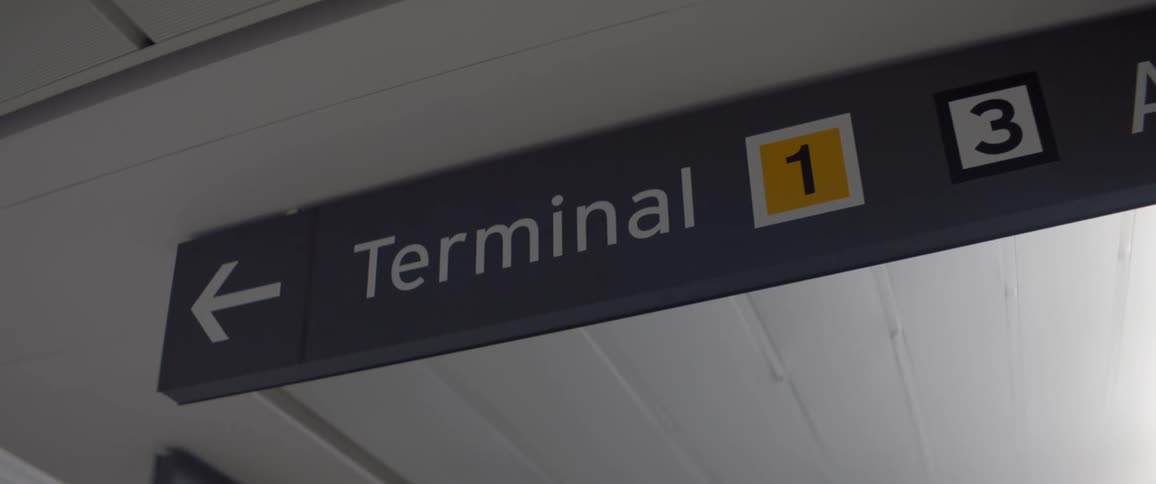 A airport terminal sign