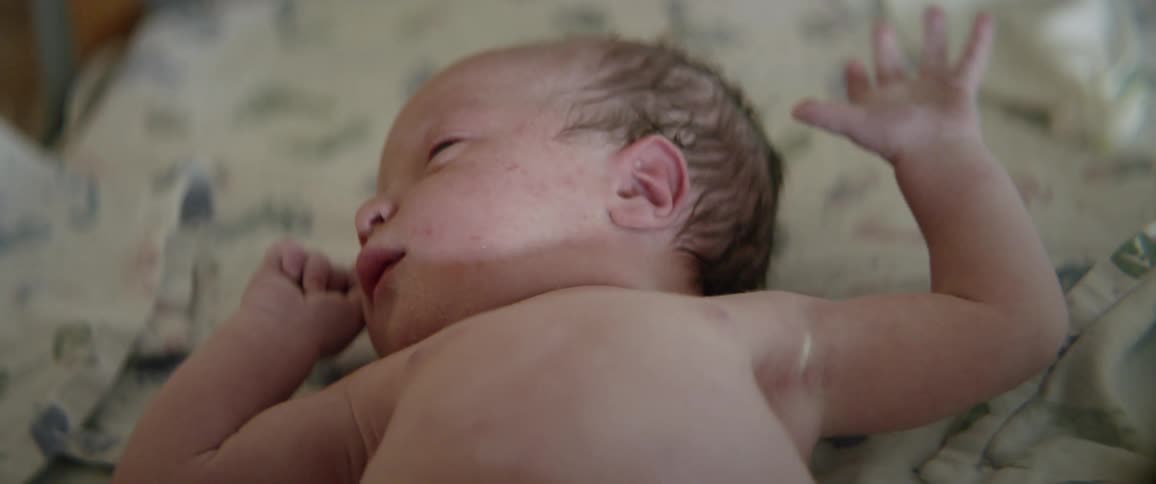 A newborn baby rests