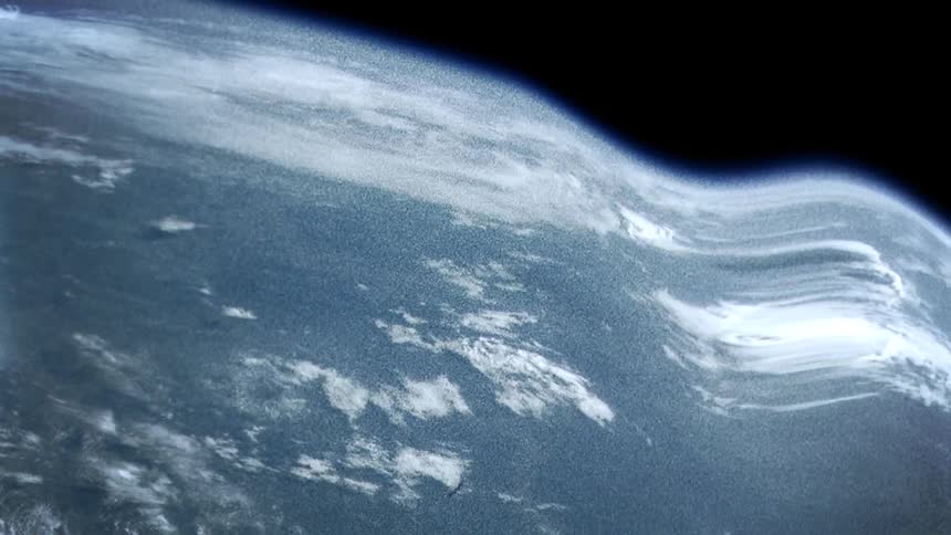 The earth from space with ocean and clouds and black space in the background