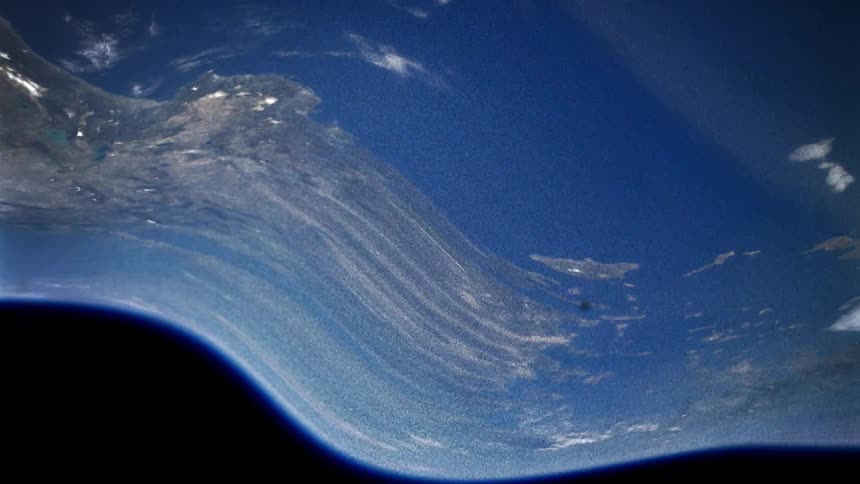 The earth from space with ocean clouds and land