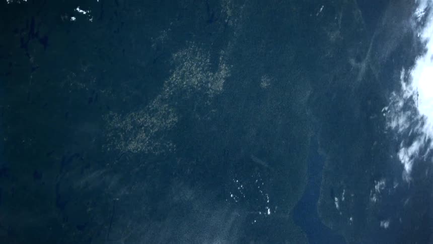 The earth from space with ocean clouds and land