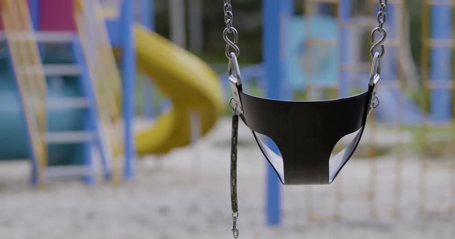 A seat for swinging on hung from above on chains