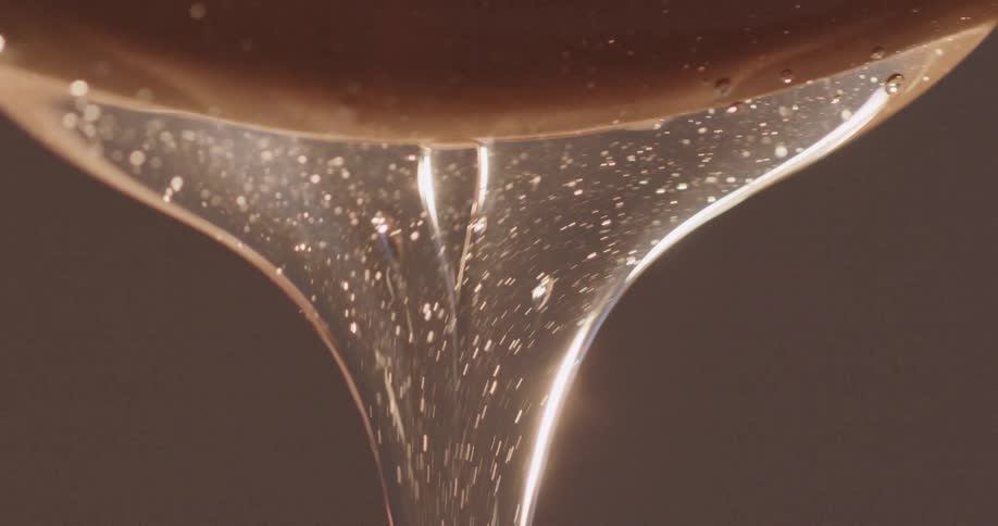 Liquid being poured out of a cup