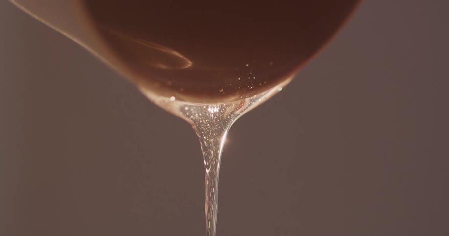 A clear flowing liquid with air bubbles