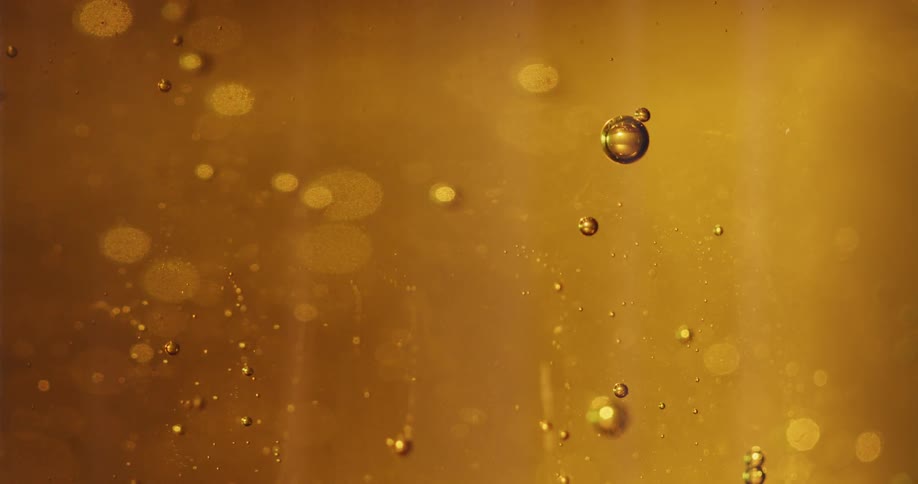 Small bubbles float in the liquid