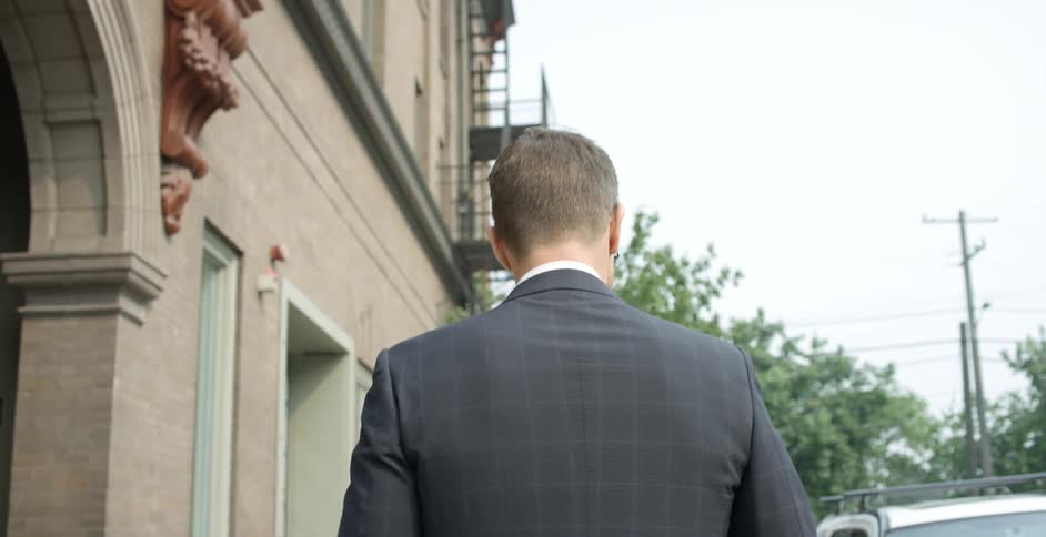 A man walking down a city street