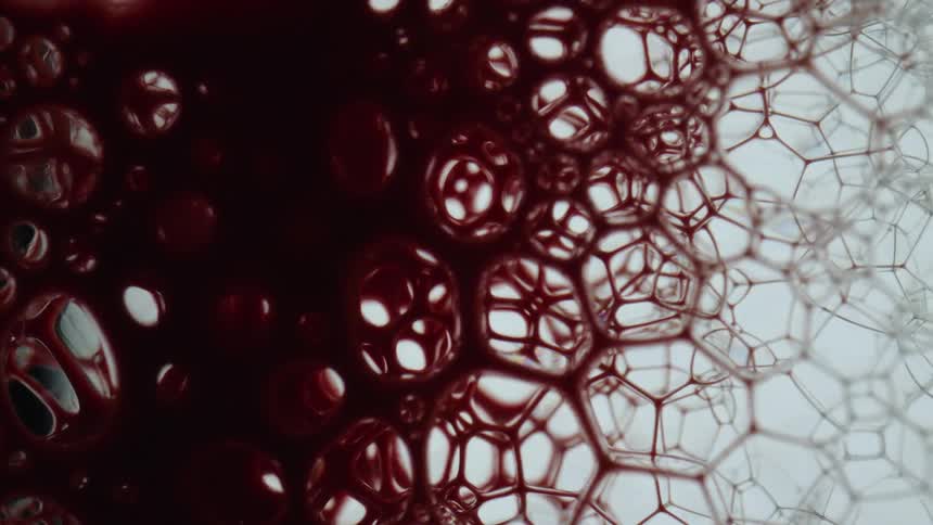 Dark liquid spreads in a web