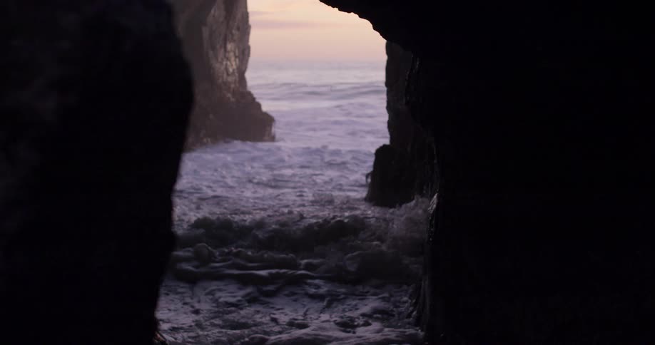 Waves crashing between rocks