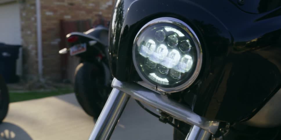 A woman sitting on a motorcycle