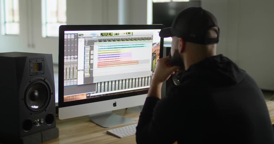 A man is working at a computer