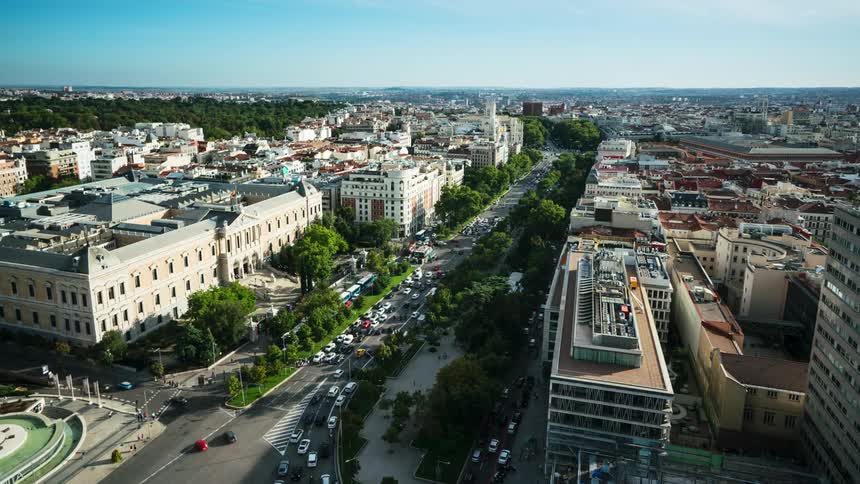 An aerial view of a downtown city is displayed