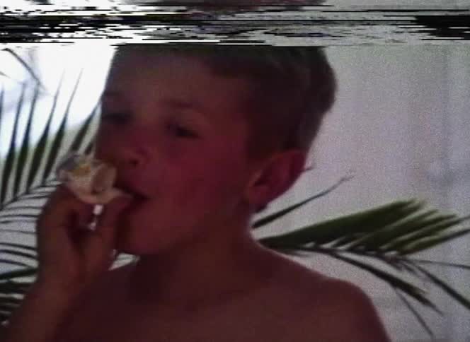 Vintage vhs videotape of a boy celebrating birthday