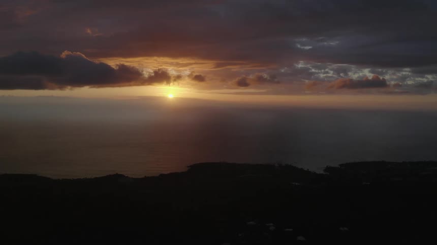 The sun setting over the water