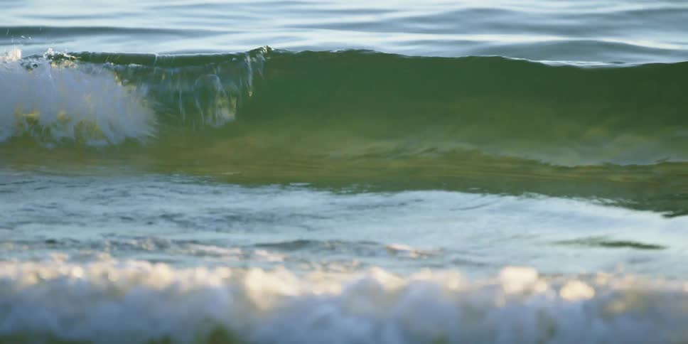 Ocean waves roll towards the shore