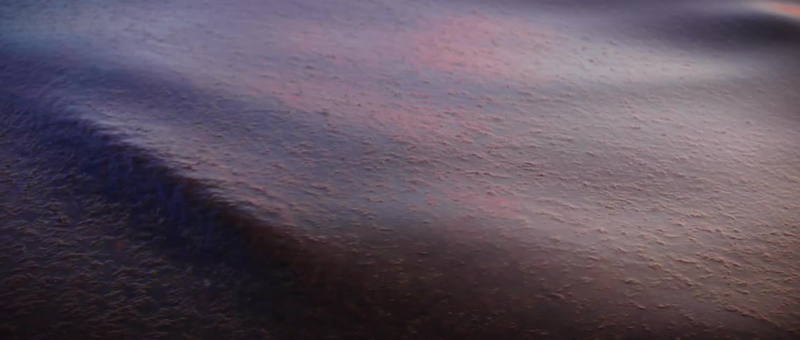 A view of the ocean waves is displayed