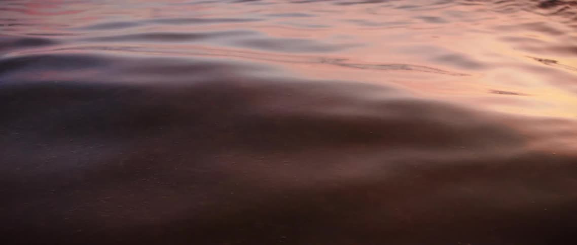 Rough ocean water produces waves