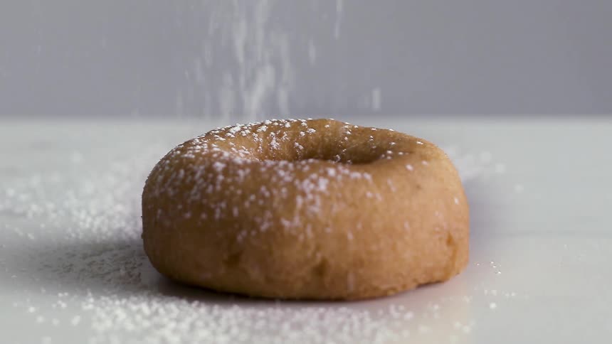 Doughnut sprkinled with confectioners sugar
