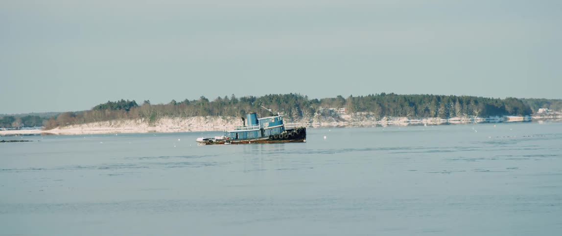 Passing by a tugboat in coastal waters