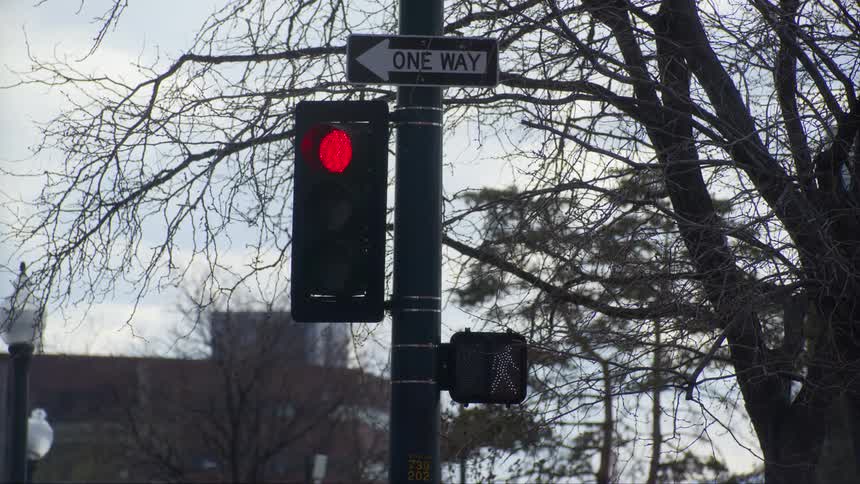 The traffic light turns green to red