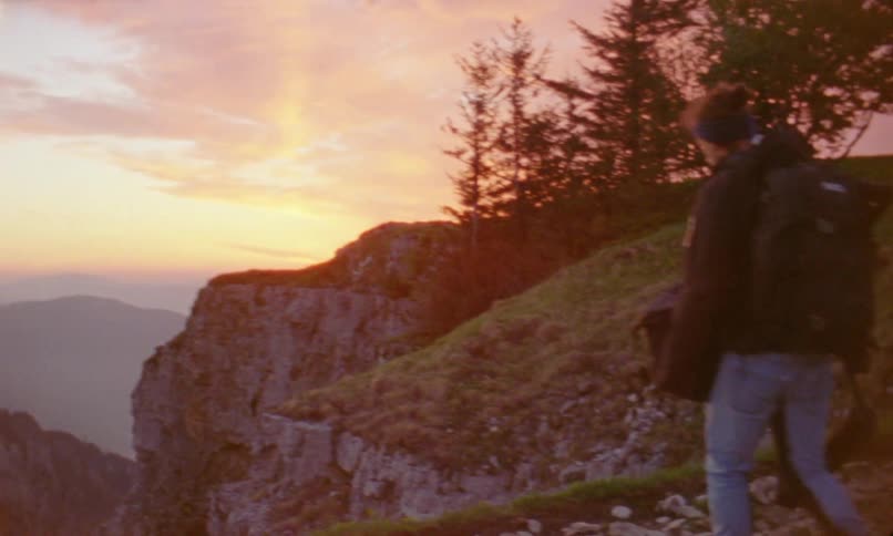 A man is hiking on the mountain