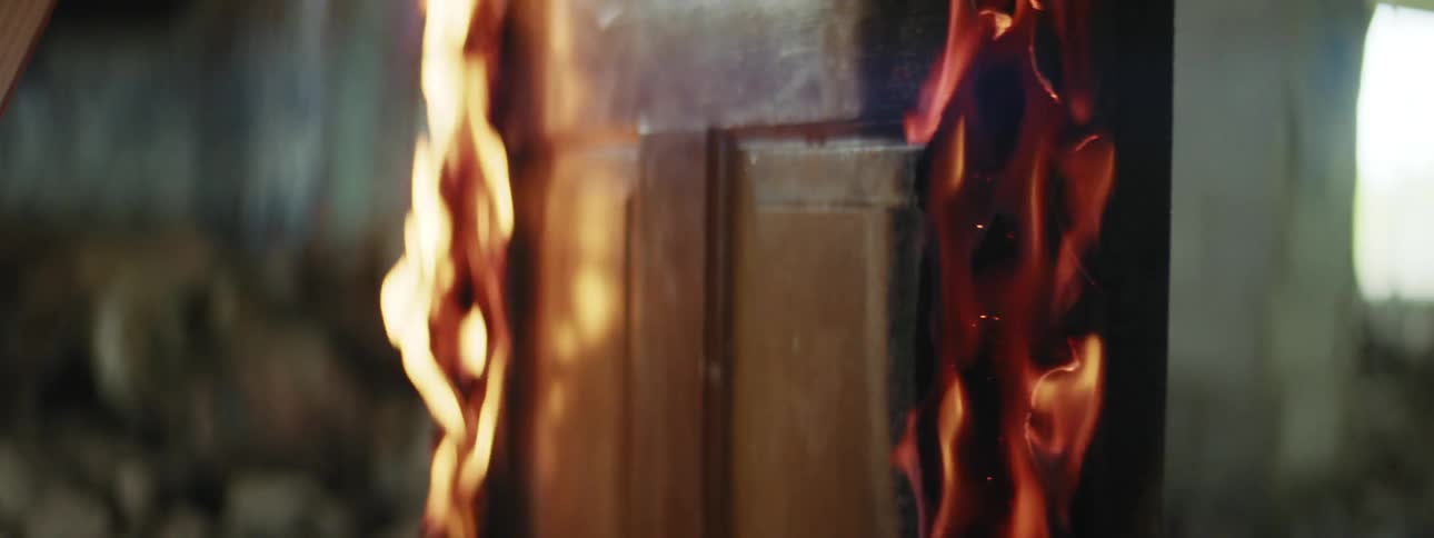 A door in a building is on fire