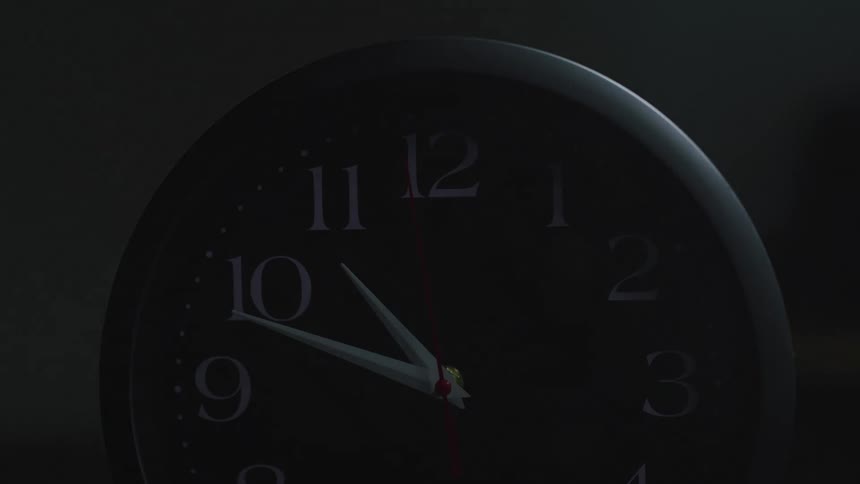 The second hand moves on the round analogue clock