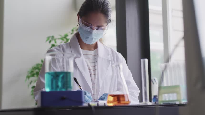 A scientist is working in the lab
