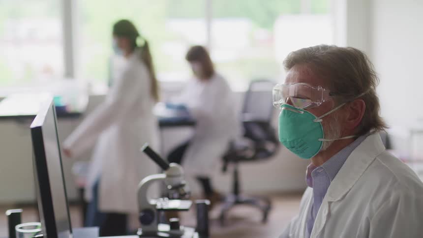 Scientists work in the lab