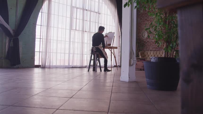 An artist works at home