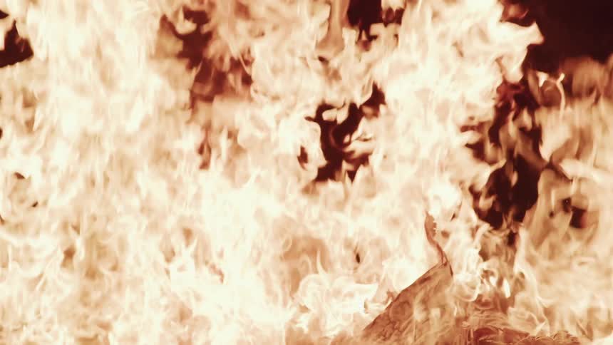 The flames are large in the bonfire