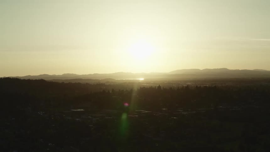 The sun sets over the horizon