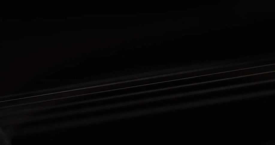 The light blinks on guitar strings