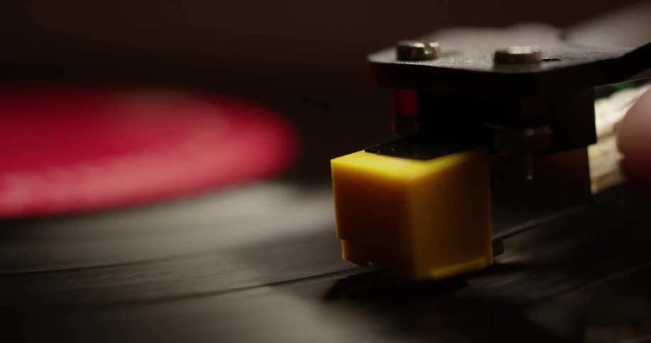 A record is turning as a needle is placed